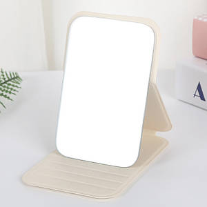 Зеркало прямоугольной формы раскладное одностороннее цвет слоновая кость из эко кожи высота 11 см ширина 7 см