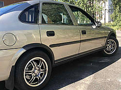 Накладки на арки (4 шт, чорні) ABS пластик для Opel Vectra B 1995-2002 рр