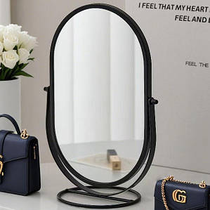 Дзеркало настільної овальної форми металеве на підставці чорного матового кольору висота 31 см ширина 20 см