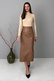 Пряма жіноча спідниця з розрізом ззаду зі штучної шкіри 44-50 разміри охрова