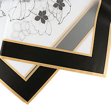 Пакувальний папір, прозорий із чорними квітами, широка чорна окантовка, матова 57*57