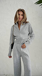 Жіночий трикотажний костюм з кофтою на блискавці з коміром-стійкою та широкими штанами