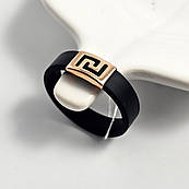 Каблучка із золотом та орнаментом із чорного каучуку 0.37