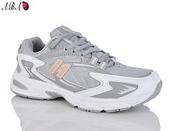 Модні жіночі кросівки в сірому кольорі