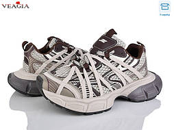 Стильні модні жіночі кросівки в коричневому кольорі