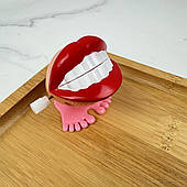 Іграшка у вигляді ходячих зубів з механізмом (губи), 1 шт