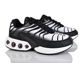 Жіночі кросівки в білому кольорі