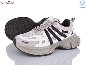 Жіночі модні кросівки в коричневому кольорі