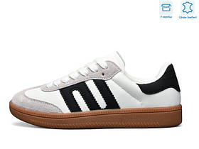 Жіночі кросівки в білому кольорі