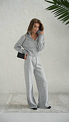 Мʼякий комфортний жіночий костюм укорочена кофта на блискавці і вільні штани Dof6169