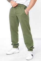 Штани чоловічі спортивні з начосом однотонні на манжетах