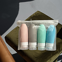 Дорожні флакони для косметики 4 шт Набір дорожніх пляшок Дорожній набір баночок Ємності для подорожей ARTK-Shop