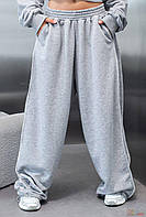 Модные широкие серые спортивные штаны для девочки подростка