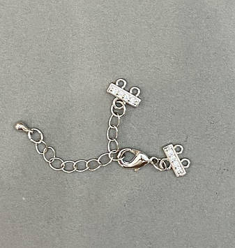 Замок для браслетів і бус на 2 нитки зі стразами і подовжувальним ланцюжком сріблястий метал d-9х12мм L-5см