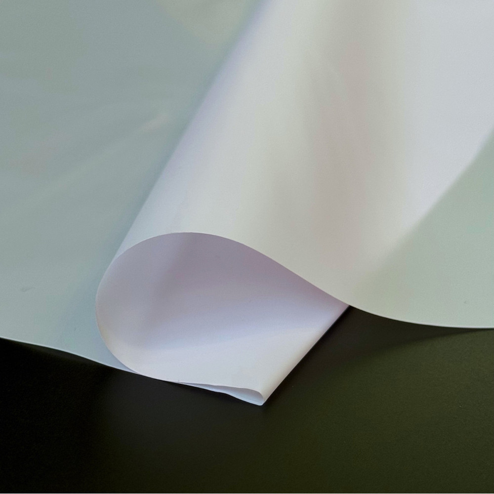 Флористична калька плівка для упаковки квітів, матова напівпрозора, 56х56 см, світло лілова (20 листів), фото 1