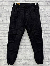 Чоловічі стильні джогері на гумки з кишенями в чорному кольорі