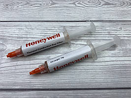 Рідка термопрокладка Honeywell Ht7000 10г шприц Терможвачка, Термопластилін 7 W/mK рожева