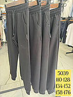 Чорні спортивні штани на хлопчиків 134,140,146,152 зросту TAYFUR-DOFFBI