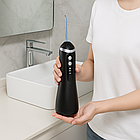 Іригатор для порожнини рота 150 мл, чорний, портативний прилад з USB зарядкою і 4 насадками для догляду за зубами, фото 2