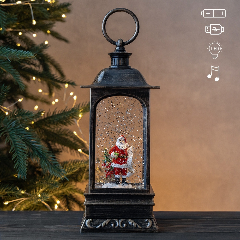 Новорічний ліхтар з підсвічуванням та музикою Санта та новорічні чудеса 27 см 19240-020, фото 1