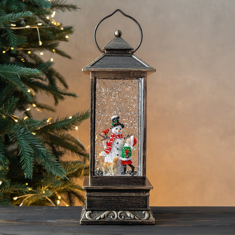 Новорічний ліхтар із підсвічуванням та музикою Сніговик 31 см 19240-021