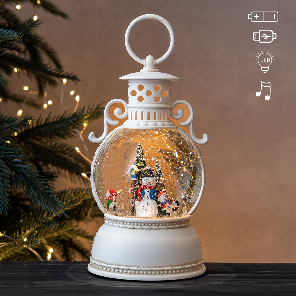 Новорічний ліхтар з підсвічуванням та музикою Сніговик з ялинкою 24 см 19240-030