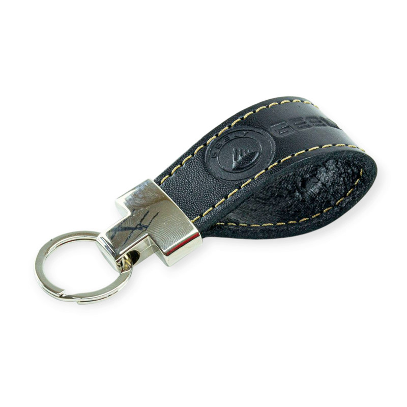 Брелок geely шкіряний тиснений чорний, прострочений, метал. затискач, фото 1