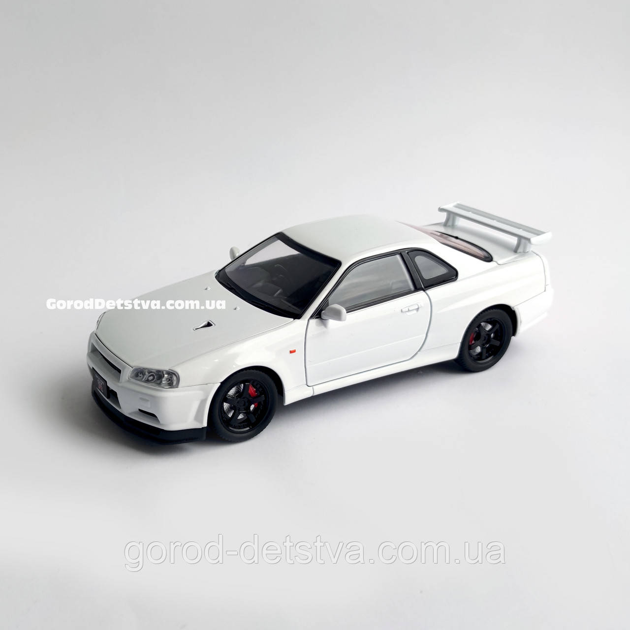 Металева машинка Nissan Skyline GT-R R34 1:24 Колекційна модель з «Форсаж 2» з дверима, що відкриваються, фото 1