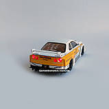 Металева машинка Nissan Skyline GT-R R34 1:24 Колекційна модель Авто Експерт з дверями, що відкриваються, фото 4