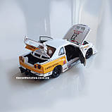 Металева машинка Nissan Skyline GT-R R34 1:24 Колекційна модель Авто Експерт з дверями, що відкриваються, фото 5