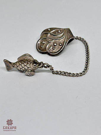 Срібні запонки, затискачі, брошки та ін.