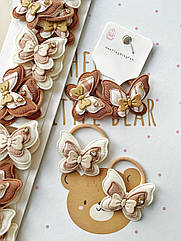 Резинки для волосся дитячі оптом 10 пар/уп МЕТЕЛИК З БАНТИКОМ ТА КАМІНЦЕМ