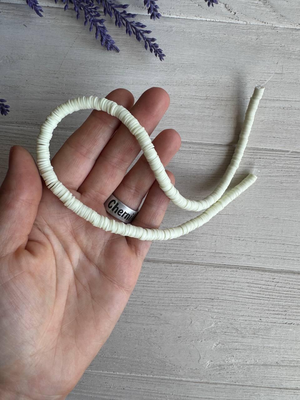 Нитка намистини плоскі 6 мм каучук, айворі 40 см