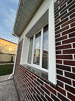 Вікно з встановленим відливом із натурального токівського граніту