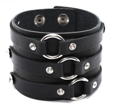 Широкий жіночий браслет "Princino" з натуральної шкіри та прикрашений декоративними стразами та кільцями, фото 1