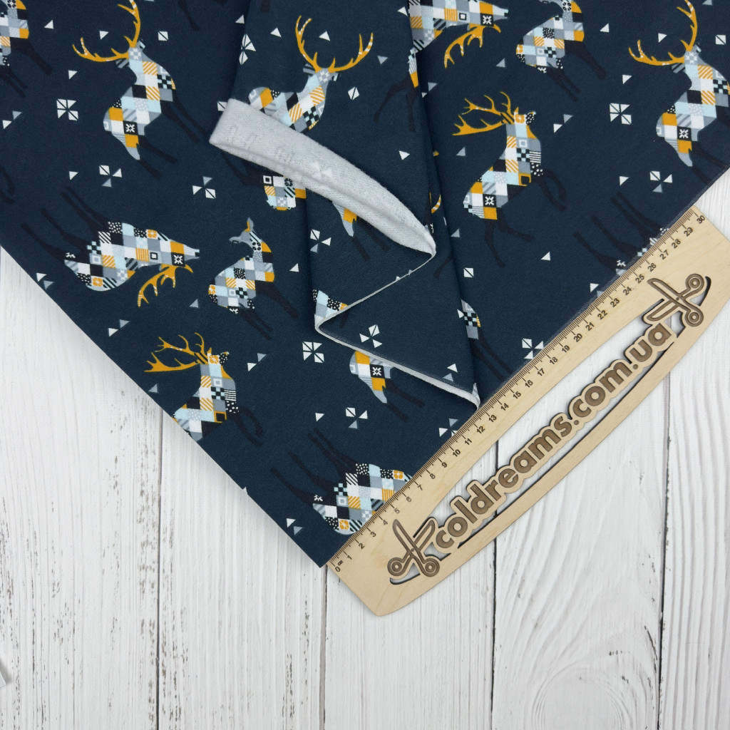 Футер двунитка с начесом "Північні олені"-180см.(ротация).100%хб кожні 60см є маленька плямка розмитоВІДРІЗ 1м