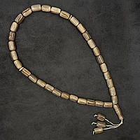 Чітки пластикові з бежевими великими намистинами та висувкою кількість намистин 33 штуки довжина 80 см