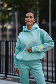 Жіночий мятний спортивний теплий костюм на флісі з патріотичною вишивкою