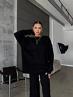 Жіночий вʼязаний костюм двійка з світшотом oversize та брюками палаццо