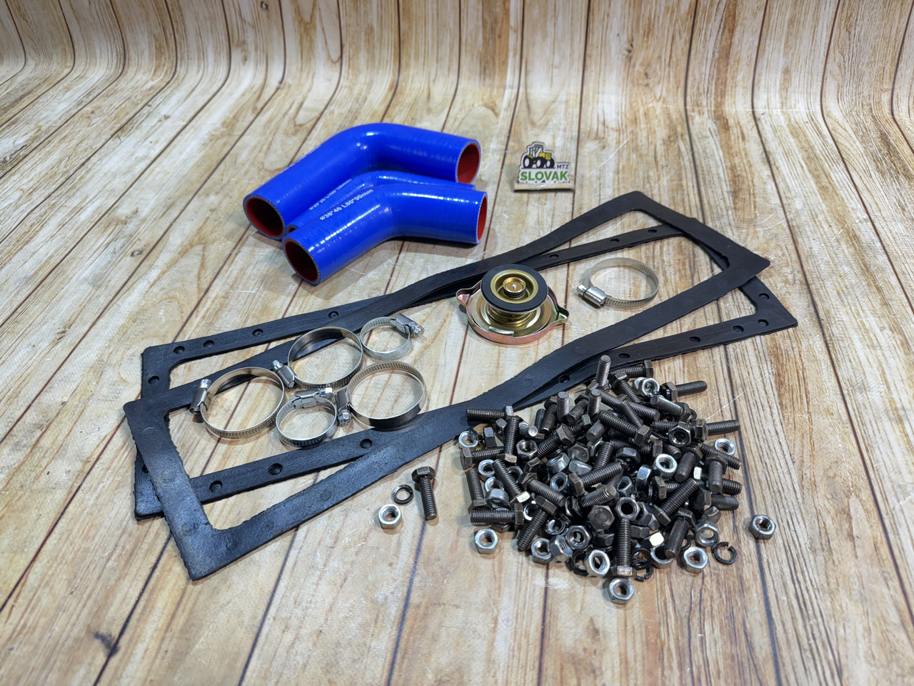 Ремкомплект радіатора МТЗ (прокладки, патрубки, хомути, термостат, кріплення), фото 1