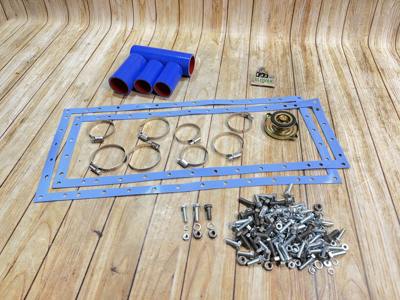 Ремкомплект радіатора ЮМЗ-6 (під стартер) (силіконові патрубки сині, прокладки, кришка радіатора, кріплення), фото 1