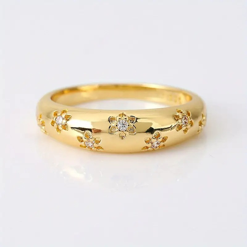 Обручка жіноча золотиста з вирізаними квітами і білими кристалами 18 AurumLux030, фото 1