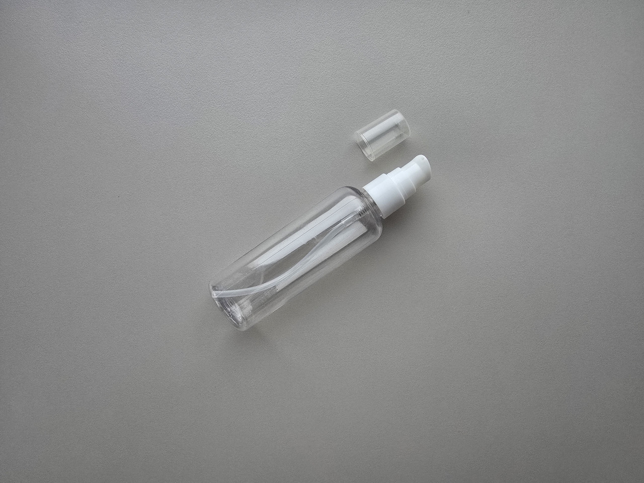 100 - 107 мл флакон Круглий прозорий ПЕТ з білим кремовим дозатором 20/410 для кремів, гелей, шампунів