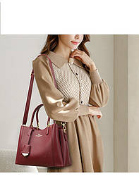 Жіноча сумочка з натуральної шкіри темно-червоного кольору