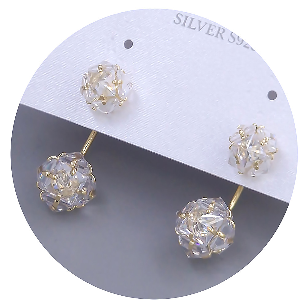 Сережки-гвоздики FJ. Позолота лимонного відтінку. Камені: білий циркон. Довжина: 22 мм. Ширина: 10 мм.