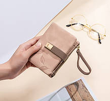 жіночі та чоловічі гаманці