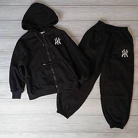 Чорний трикотажний спортивний костюм для хлопчика для дівчинки