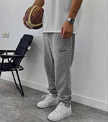 Оверсайз спортивні штани Nike об'ємні штани Nike широкі сірі