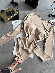 Жіноче спокусливе сексуальне бежеве боді з ефектом PUSH-UP і з довгими рукавами з мікродайвінгу