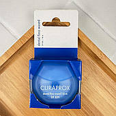 Нитка міжзубна вощена Curaprox DF 834 з ароматом м'яти, 50 м